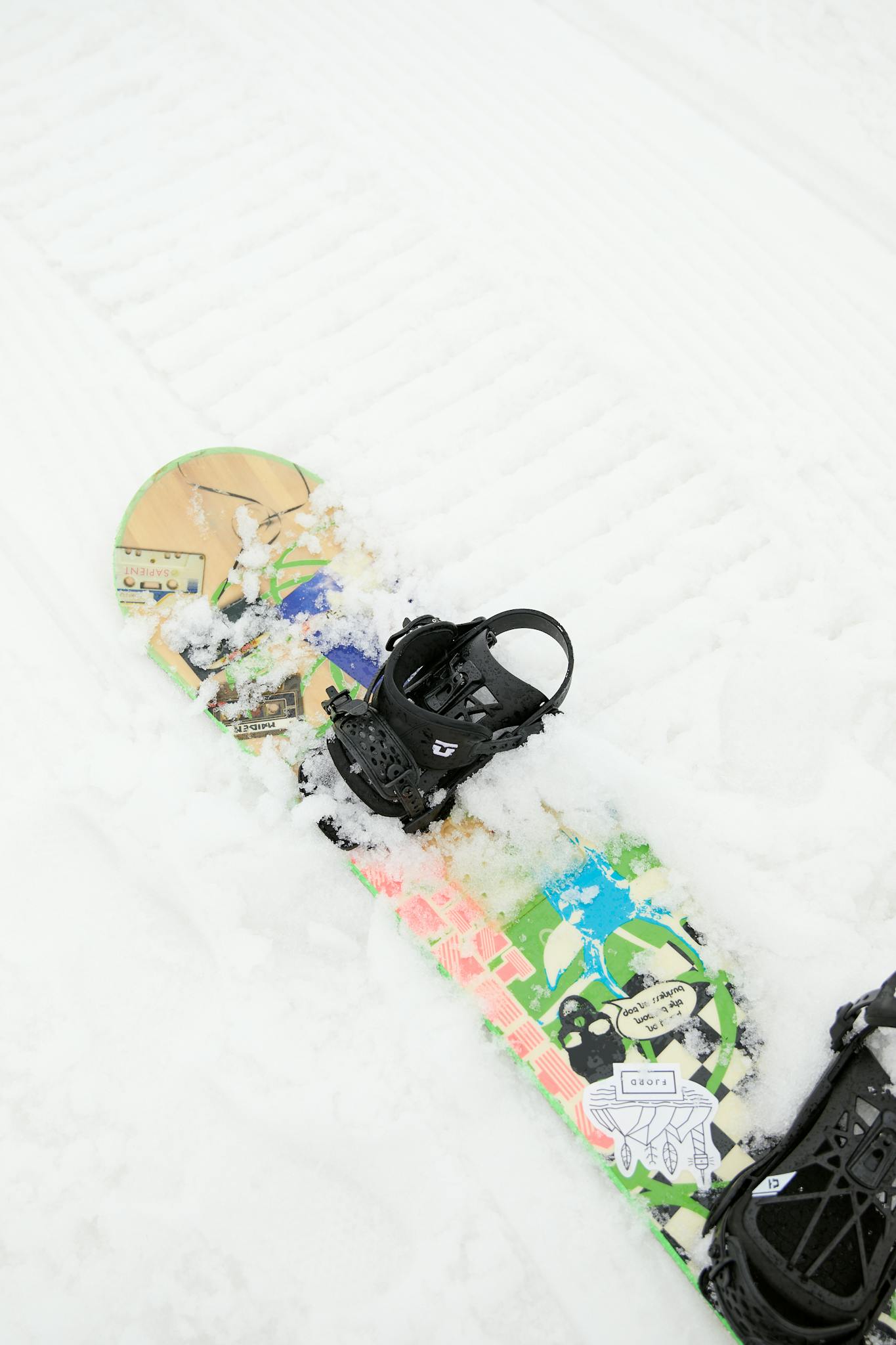 A Snow Covered Snowboard